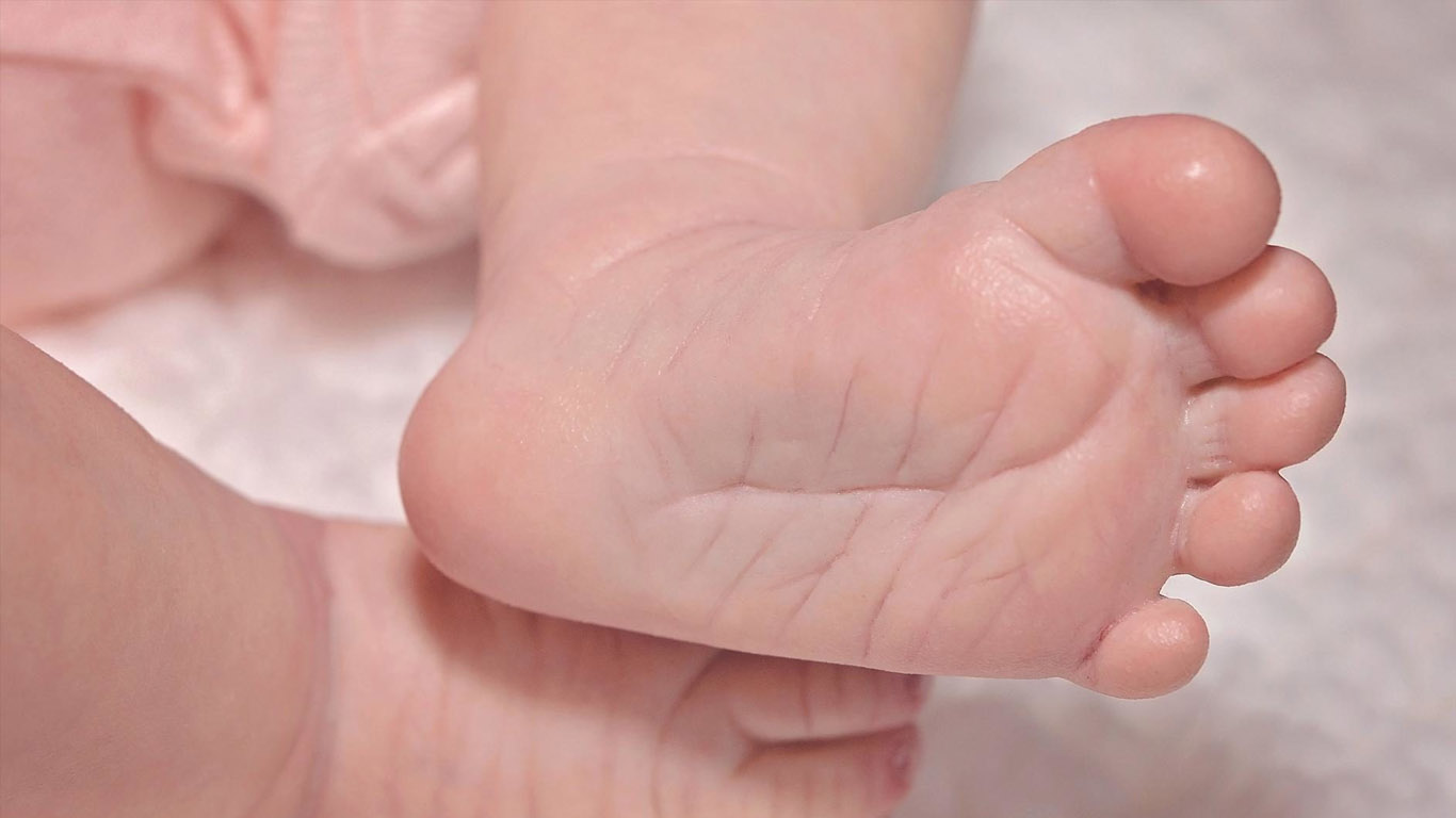 A child patient is being examined.